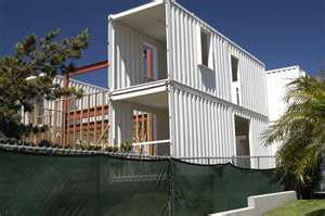 Shipping container house under construction.